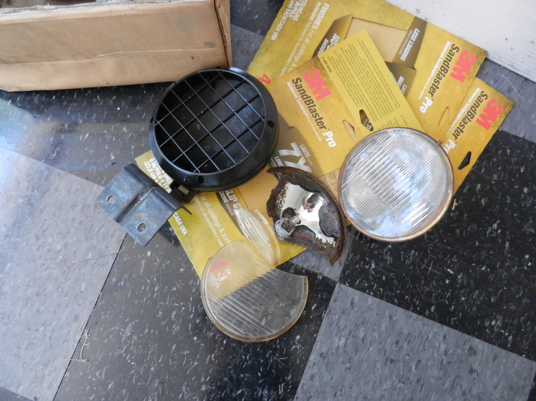 The factory fog lights are pretty much junk; but the plastic guards are still good.