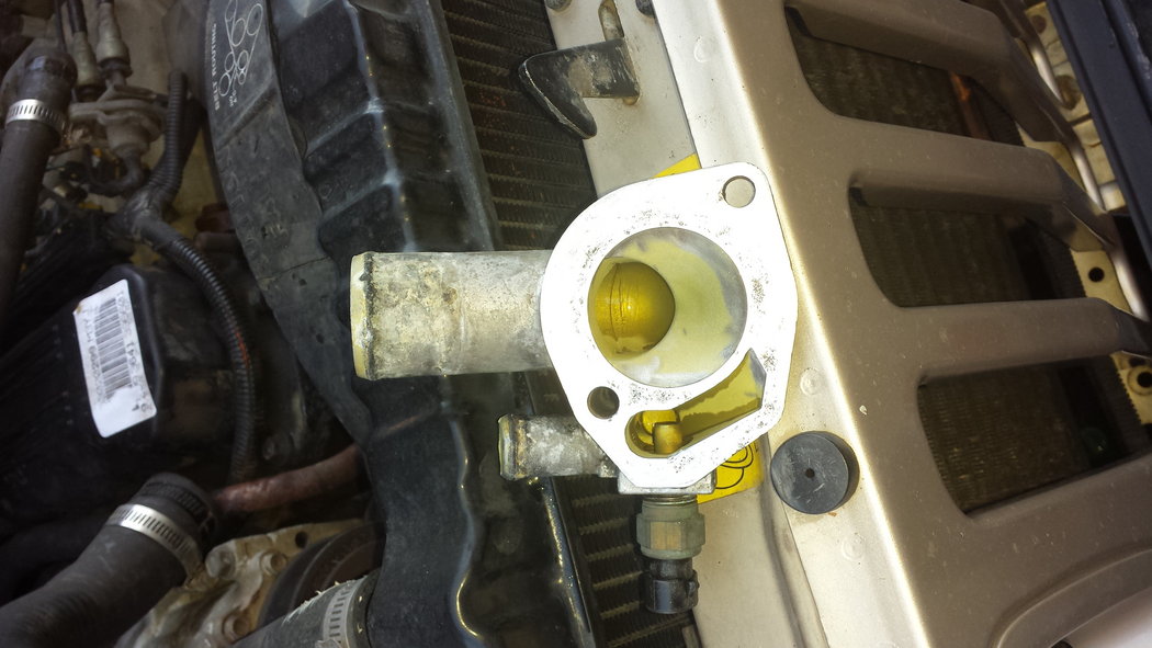 This is the thermostat housing, cleaned and ready to install with the new thermostat.