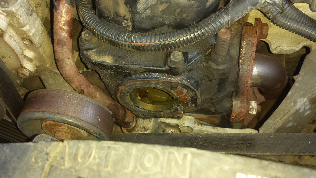 The front of the block where the thermostat and housing go. You will have to clean off all of the old gasket before reinstalling.