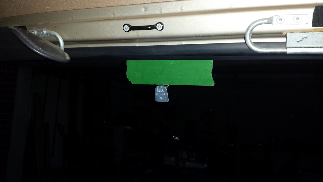 I marked the height with masking tape and then the center of the windshield with a dry erase marker all on the outside of the window before I got started.