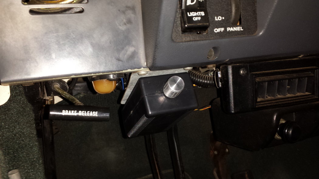 Dimmer switch mounted under dashboard on left side.
