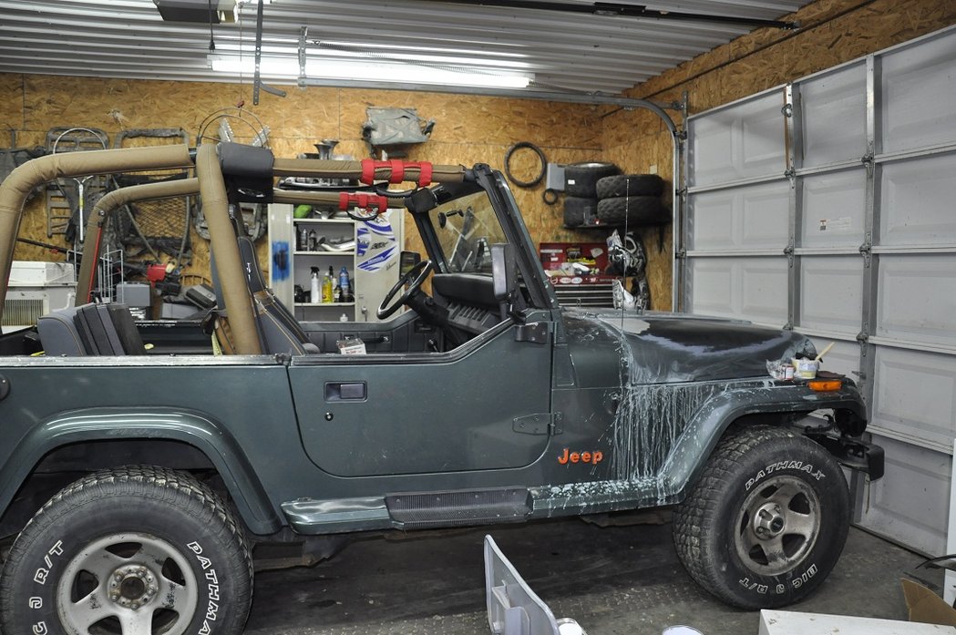 about an hour sanding but finally made it to the factory paint in the spot im working on :lol: