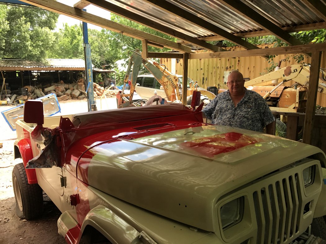 Jeep 04 and my dad after we finished paint but before removing the stencils